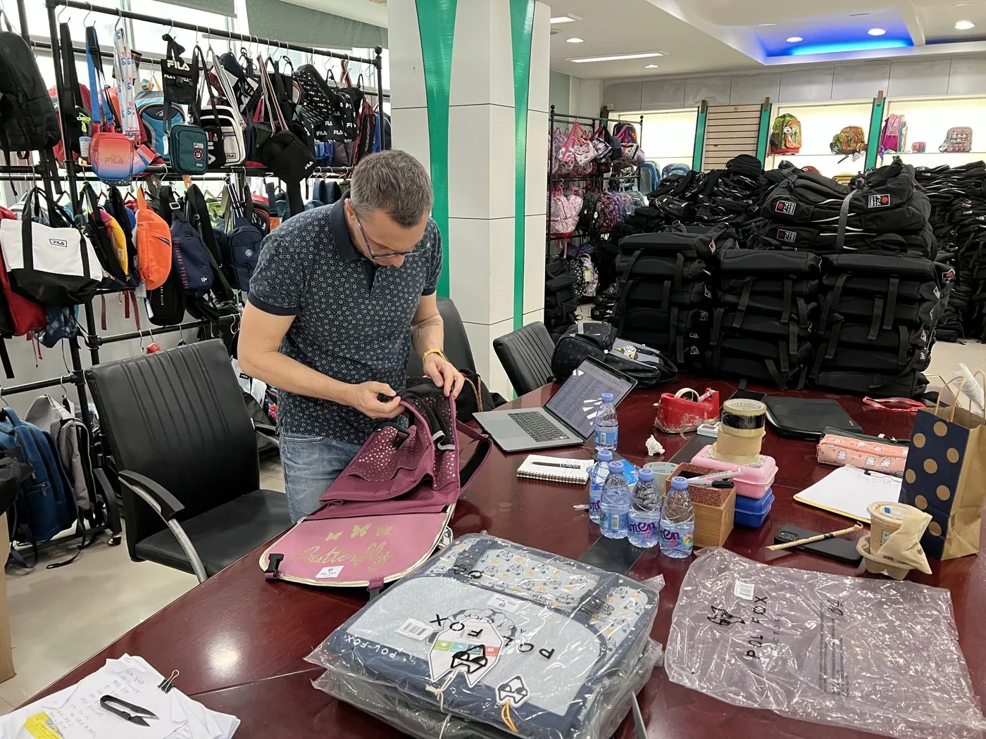 Fabrice Raffo inspecting bags at the factory